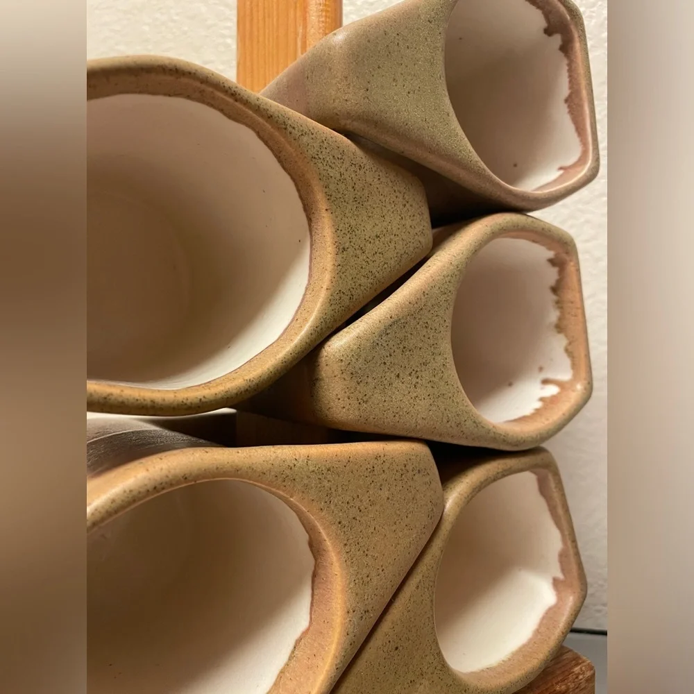 Rodolfo Padilla stacking mugs